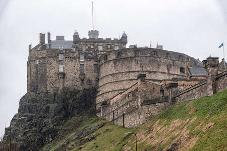 A typical rainy day in Edinburgh with the castle covered in mist in the background.の写真素材