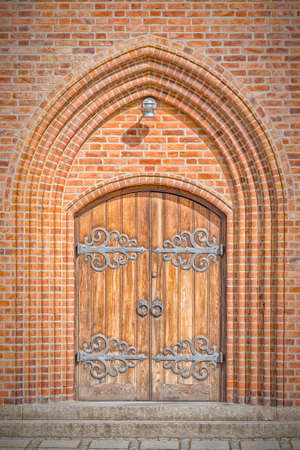 The entrance doorway to a church in the Danish town of Helsingor.の写真素材