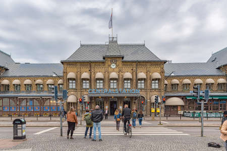 GOTHENBURG, SWEDEN - MAY 13, 2017: Commuters crossing the road on their way to or from the central train station in the Swedish city of Gothenburg.のeditorial素材