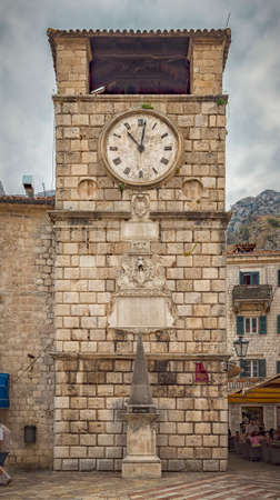 The Clock Tower on the Square of Arms in the Old Town of Kotor, Montenegro.の写真素材