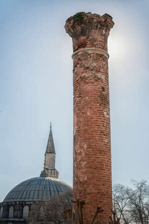 An old brick column or mineret near to a mosque in Istanbul, Turkey.の写真素材