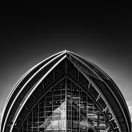 A fine art black and white edit of the armadillo auditorium in Glasgow near to the river clyde.のeditorial素材