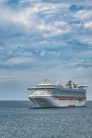 HELSINGBORG, SWEDEN - JULY 15, 2009: The luxury cruise ship Grand Prinsess sits anchored off shore...