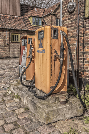 HELSINGOR, DENMARK - MARCH 24, 2019: Retro petrol pumps at a retro filling station in Helsingor, Denmark.のeditorial素材