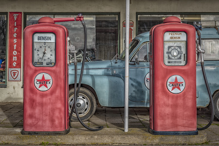 MORARP, SWEDEN - MARCH 23, 2019: Retro cars at a retro filling station in Morarp, Sweden.のeditorial素材
