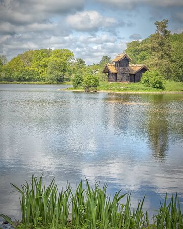 Frederiksborg is one of the most beautiful castles in Denmark situated at Hillerod. And the old cabin on the grounds is associated to a legendary ghost storyのeditorial素材