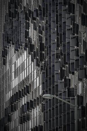 An abstract background image of windows on a multi storey car park.
