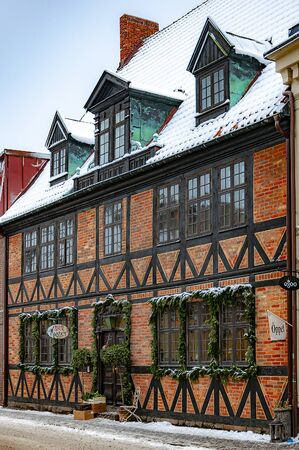 HELSINGBORG, SWEDEN - DECEMBER 17, 2010: The madame moustache pub located in the cities old town area.のeditorial素材