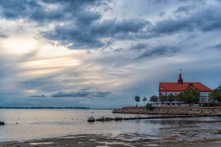 LANDSKRONA, SWEDEN - AUGUST 25, 2020: Coastline hotel at sunset on a summers evening.のeditorial素材
