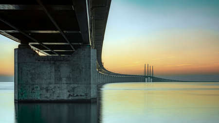 MALMO, SWEDEN - SEPTEMBER 20: The oresunds bridge that connects Sweden with Denmark at sunset.のeditorial素材