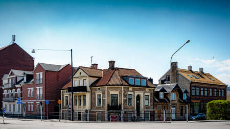 HELSINGBORG, SWEDEN - APRIL 30, 2022: Various buildings at a road junction at the residential and...