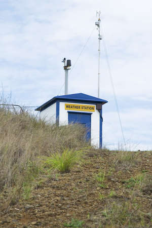 A power plant's weather station on top of a hillの写真素材