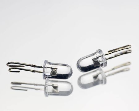 Two small light bulbs on whiteの写真素材