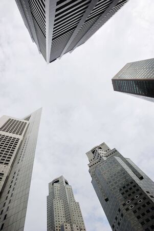 A view from below of Singapore's business districtの写真素材