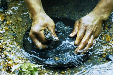 Hands of Gold Panner in the Philippinesの写真素材