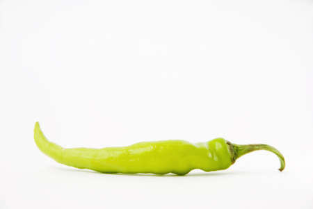 Chili green pepper on white background, shallow DOFの写真素材