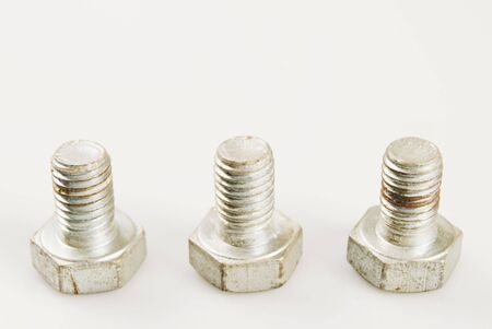 Rusted bolt against white backgroundの写真素材