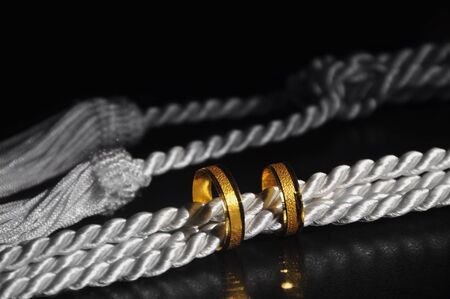 Wedding Rings on bridal cordの写真素材