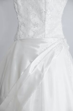 White wedding gown on gray backgroundの写真素材