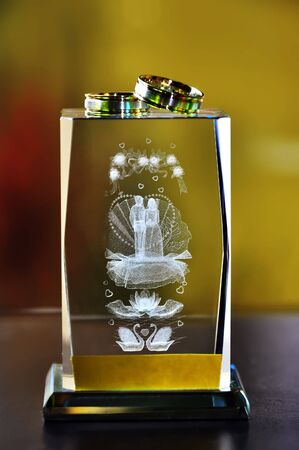 Wedding Rings on decorative wedding glassの写真素材