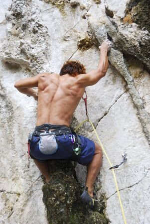Young man bouldering in Montalban, Philippinesの写真素材