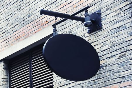 A black, blank signage in an old European structure in Shanghai, Chinaの写真素材