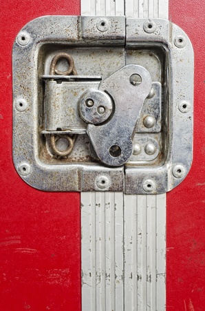 Metal latch on equipment trunk