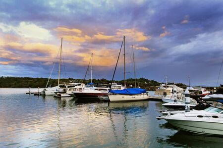 White boats anchored in a private marina, Philippinesの写真素材