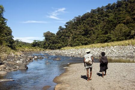 Old Agta couple on foot to the nearest town, an 8 to 10-hour hike.のeditorial素材