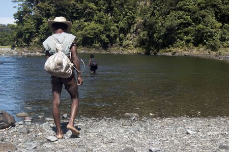 Old Agta couple on foot to the nearest town, an 8 to 10-hour hike.のeditorial素材