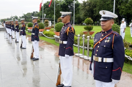 Manila, Philippines - August 7, 2011:  Members of the Philippine Navy stand at attention during a ceremony in front of Rizal's monument in Luneta.のeditorial素材