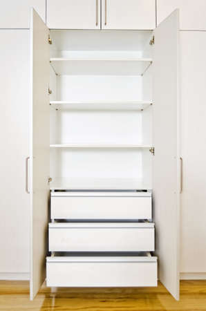 Built-in cabinet in room of an unoccupied newly-built apartment.の写真素材
