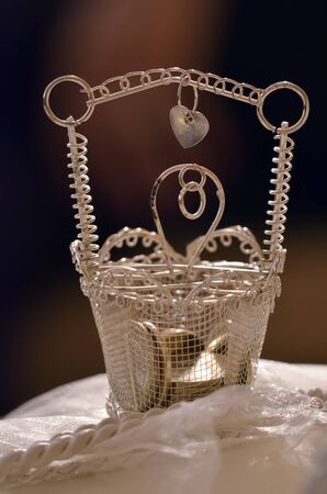 Arras and 13 coins symbolizing the groomの写真素材