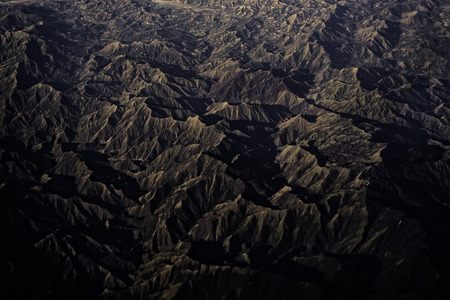 Other-worldly landscape shot from an airplane somewhere in the Philippinesの写真素材