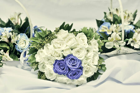 Bride and bridesmaids vintage-colored wedding bouquetsの写真素材