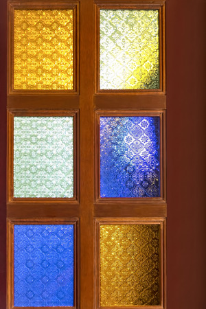 Wooden stained glass door of houseの写真素材