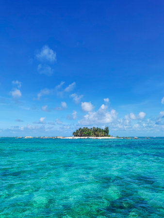 Translucent turquoise waters around a tiny island in Siargao, Mindanao, Philippines.の写真素材
