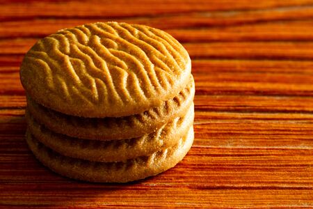 cookies on dark old wooden table with place for text., freshly baked. Selective Focus with Copy space.の写真素材