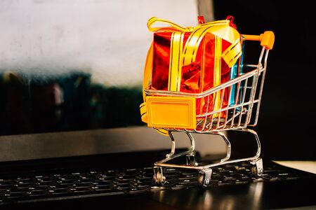 Concepts about online shopping that consumers can buy things directly from their home or office just using a few clicks via web browser.の写真素材