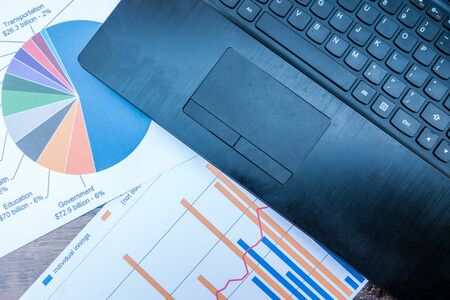 Company analyzes the company's annual financial statements, balances work with graphical documents. Economic picture, project, market, finance and tax officeの写真素材