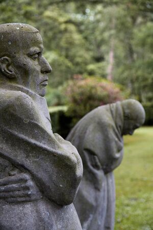 The German World War One war cemetery of Vladslo near Ploegsteert in Belgium and its statues of a grieving mother and fatherのeditorial素材