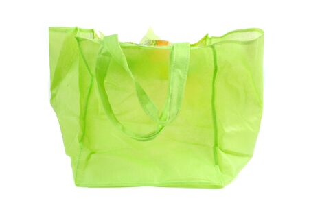 a green cotton bag isolated on white backgroundの写真素材