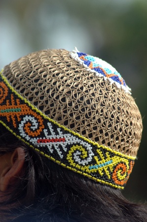 Indonesia typical cap made from wicker decorated with beadsのeditorial素材