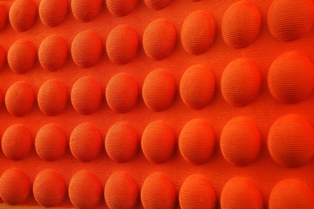detailed pattern of orange and brown seat cushionの写真素材