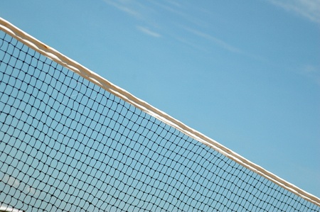 beach volleyball net with blue sky backgroundの写真素材