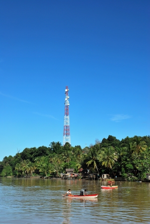 TIDENG PALE - INDONESIA - JANUARY 17, 2012 : communications transmitter towerat a village  on January 17,  2012 at Tideng Pale, Indonesiaのeditorial素材