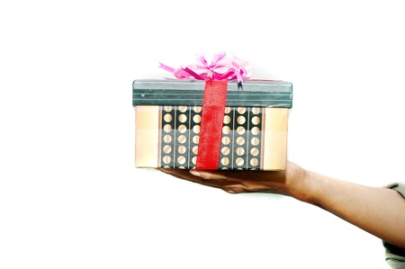 hand holding a gift isolated on white backgroundの写真素材