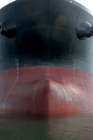 the bow of a big tanker ship, which was anchored in the middle of the oceanの写真素材