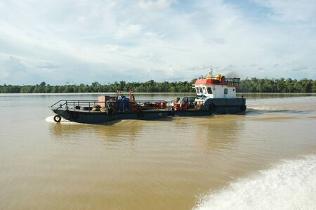 pontoon ship on the riverの写真素材