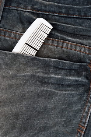 white comb in pocket jeansの写真素材
